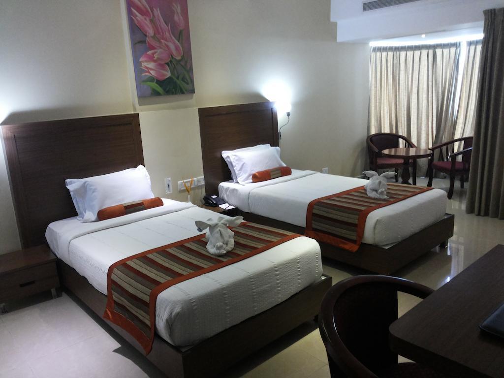 Hotel Milestonnez Sriperumbudur Oda fotoğraf
