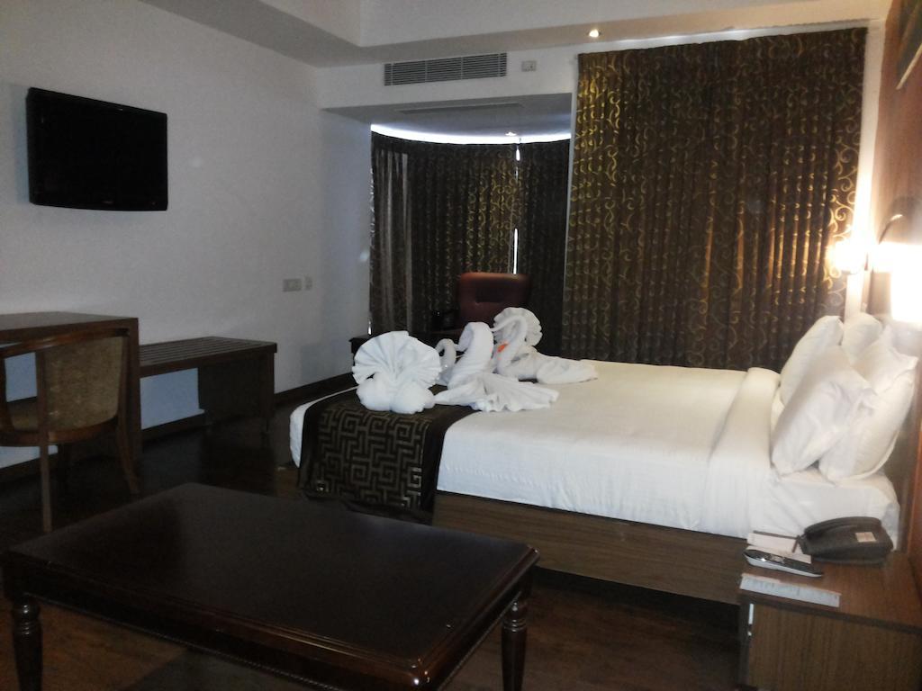 Hotel Milestonnez Sriperumbudur Oda fotoğraf