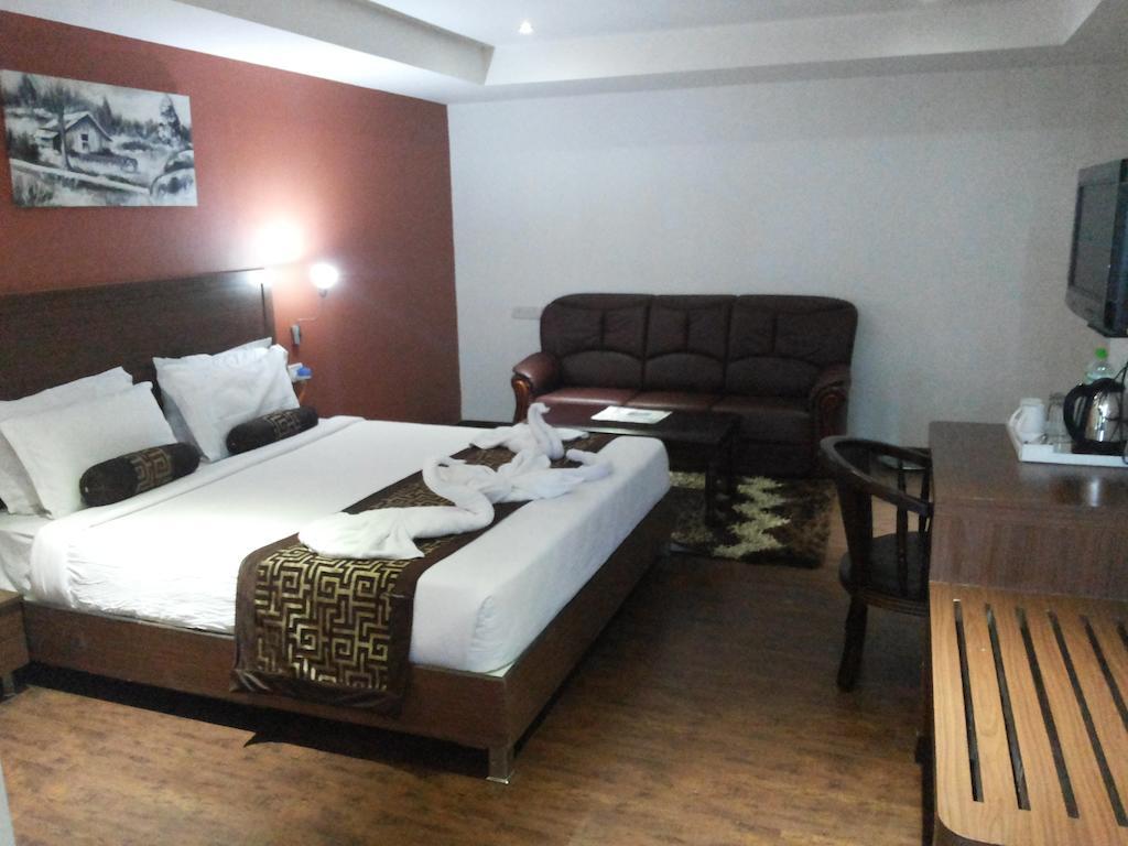 Hotel Milestonnez Sriperumbudur Oda fotoğraf